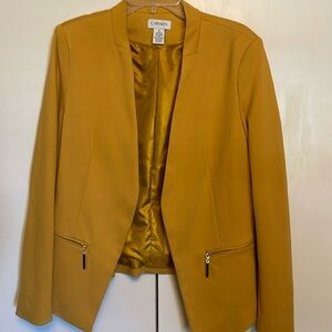 Golden yellow blazer. Rayon, Nylon and Spandex from Carmen